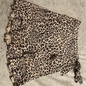 Never worn before wrap around cheetah skirt